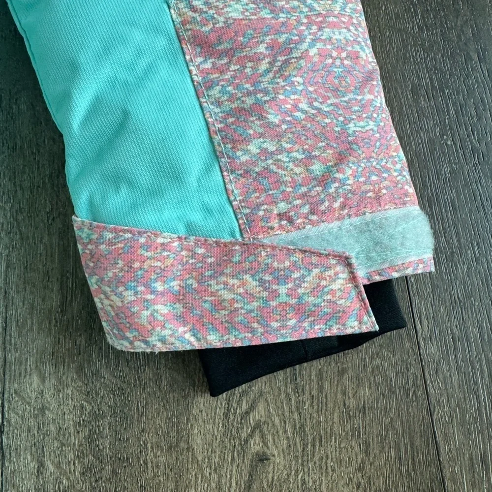 Arctix Winter Coat. Girls size large. Teal with pink details.
